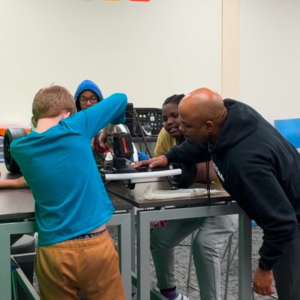 Shan Rennals shows youth how to build go-Karts in Xtreme Engineering with Virginia University Preparatory program